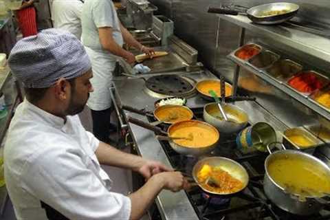 The Heat of the Curry Master''s Kitchen on a Busy Friday Night at Shambhala Village Indian..