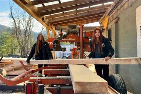 Cutting beams for garage on an LT40 sawmill with my sister